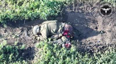 Russian Soldier Pretending to be dead after failed assault on Ukraine position gets targeted by drone operators of Drone Strike Company  ( 47 OMBr)                  (NSFW)