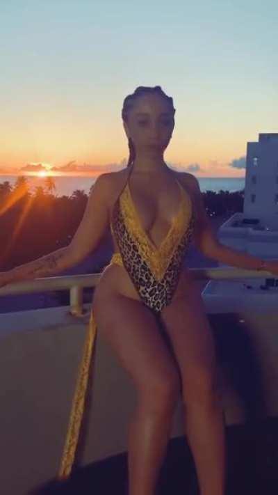 Amari in a leopard one piece part 2.