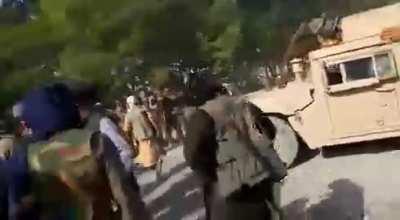 Afghan National Army mass surrendering to the Taliban on June 22, 2021. You can see ANA soldiers handing in all their firearms in a pile as well has handing in their Humvees in a straight line.