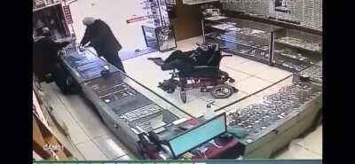 I think this goes here??? A handicapped man robs a store with his feet.