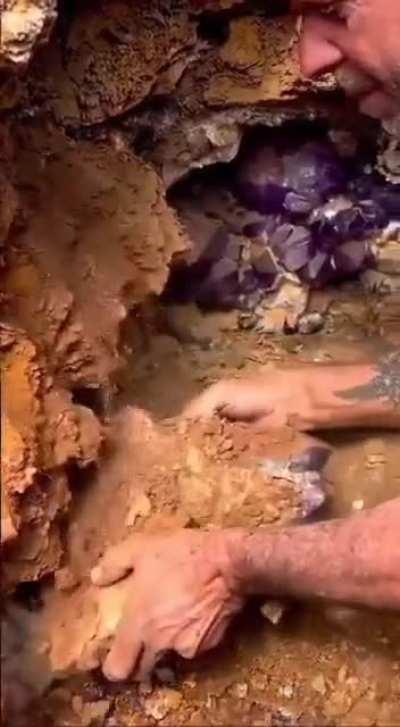 Amethyst being excavated, watch till the end isn't it stunning.