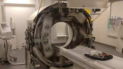 Here is the inside of a hospital's CT scanner, spinning at full speed.