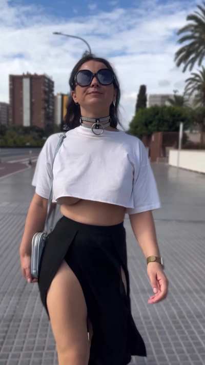 Walking in the city in a cute little underboob Croptop.