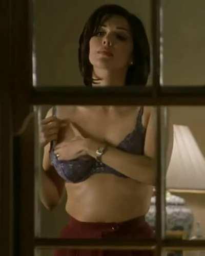 Laura Harring fantastic body in Little Nicky