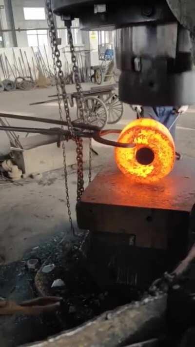 Hammering molten metal