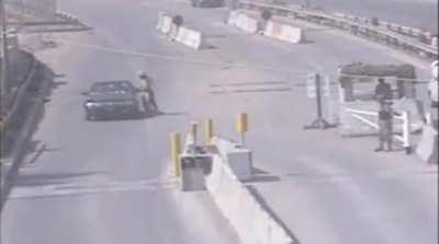 An AQI (Al Qaeda in Iraq) or ISI (Islamic State of Iraq) SVBIED attack against a checkpoint in Iraq manned by US forces in 2006.