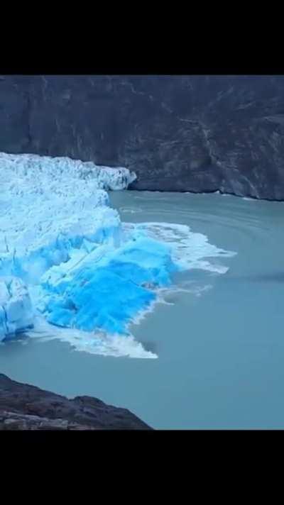 An iceberg flipping