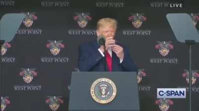 The President of The United States appears to be unable to drink water using only one hand