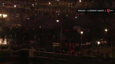 Thousands of people on the Place de la Concorde currently after the Prime Minister Elisabeth Borne announced the government was triggering Article 49.3 of the French Constitution, The decision to bypass a parliamentary vote - to raise the retirement age f