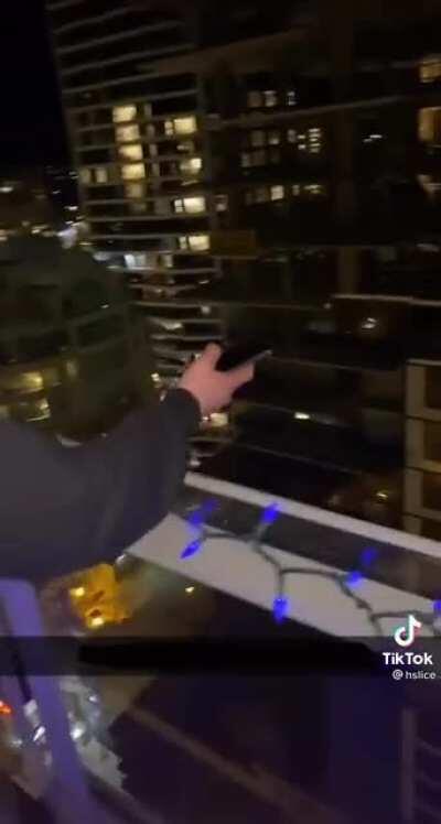 Doing tricks with your phone in the balcony