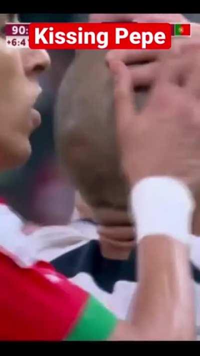 Morocco central defender kissing Pepe's head after miss