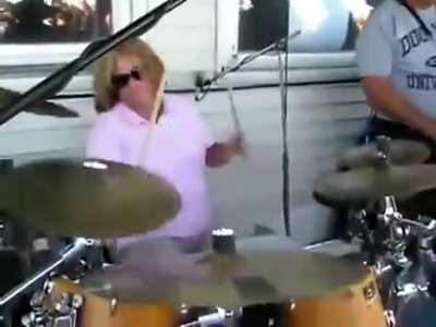 Mom absolutely shreds the Wipe Out song on the drums