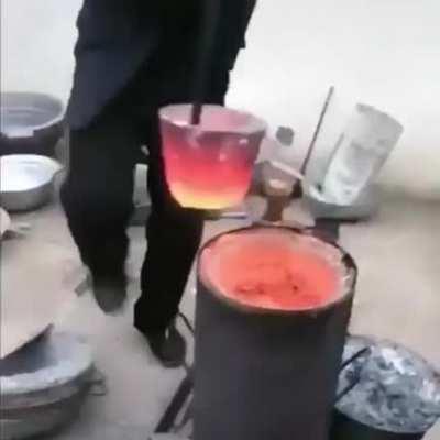 This guy melts empty Soda cans into hundreds of usable pots and pans for his community to use.