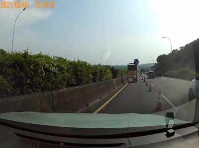 Dodge a truck on the highway in Taiwan