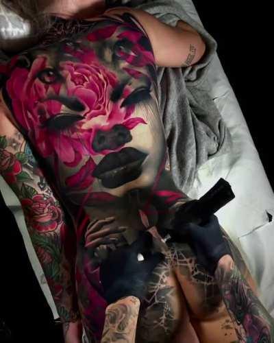 Back tattoo by © Waler Montero.