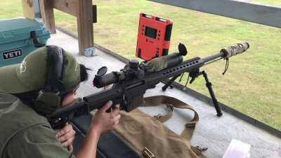 Barrett MRAD 338 Lapua ringing steel at 1k yards.