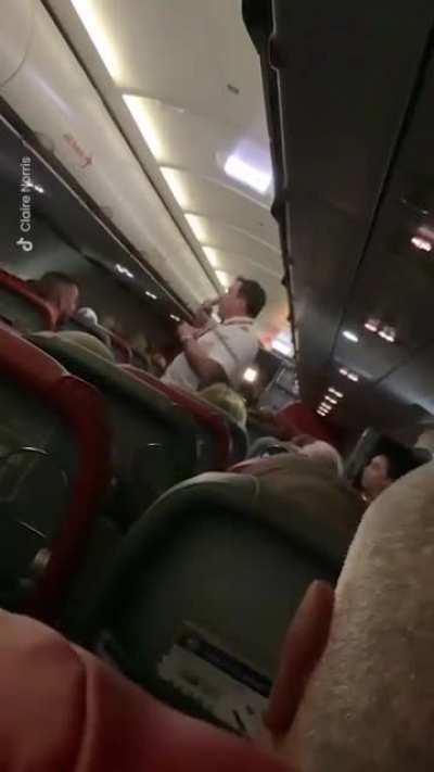 Pilot explains to his passengers why he was forced to land his plane after a security threat