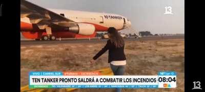 Reporter during a wildfire-related broadcast in the south of Chile