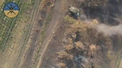 Drone-bomber of the &quot;Air Canada&quot; group of the 3rd mechanized battalion of the 72nd OMBr drops three VOG grenades on dismounting Russian infantry in quick succession