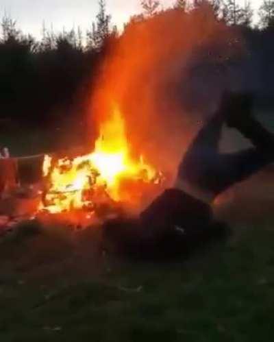 Tough kid jumping over the fire