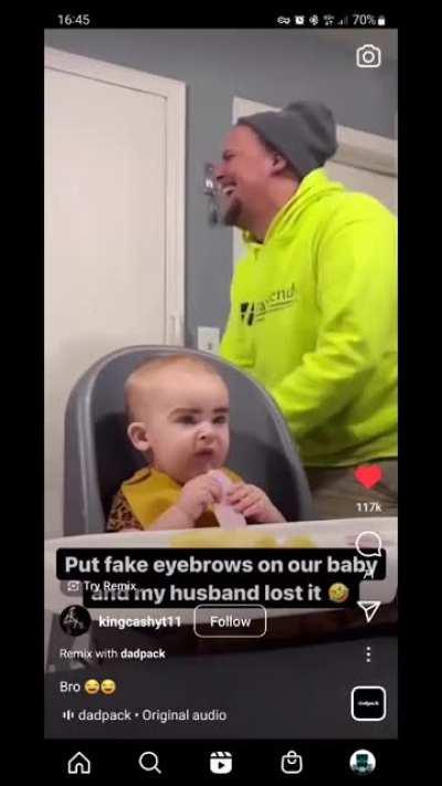 Baby with fake eyebrows makes dad crease