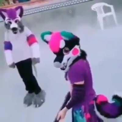 Imagine going to a public pool and seeing a fursuiter with a gun