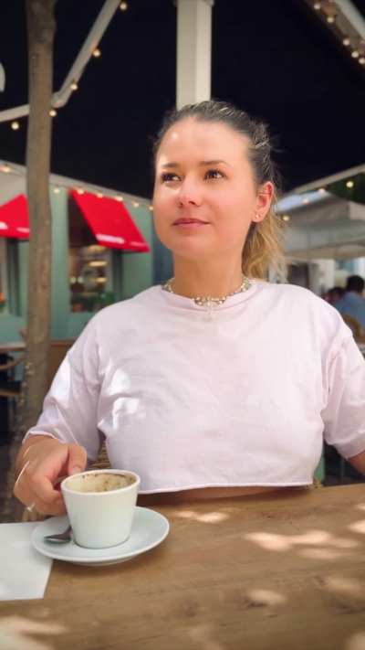 Underboob tops are perfect when drinking coffee in a busy square.