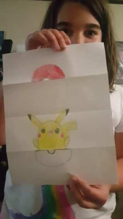 Daughter made a &quot;working pokeball&quot; picture. She was really proud.