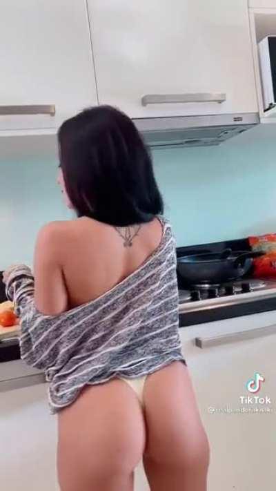 Naked cooking in the kitchen