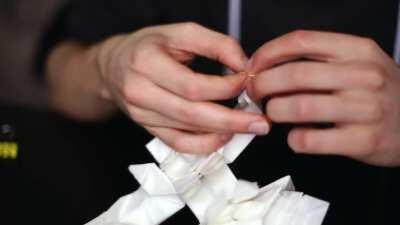 Folding process of an origami samurai from a single sheet of paper