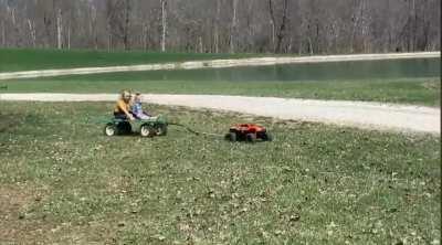 Kids enjoying my new rc toy... told them in could pull the kids on the wagon. They had a blast... Made us all laugh pretty good.