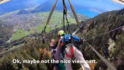 Tourist hangs on for his life, after pilot forgets to attach him to glider