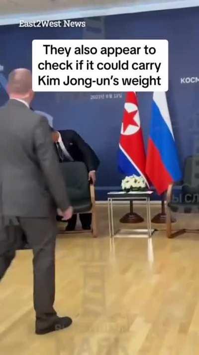 North Korean leader Kim Jong-un’s security flunky checks his chair for poison before he sits down for summit with Vladimir Putin