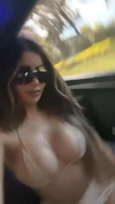 Busty in the car