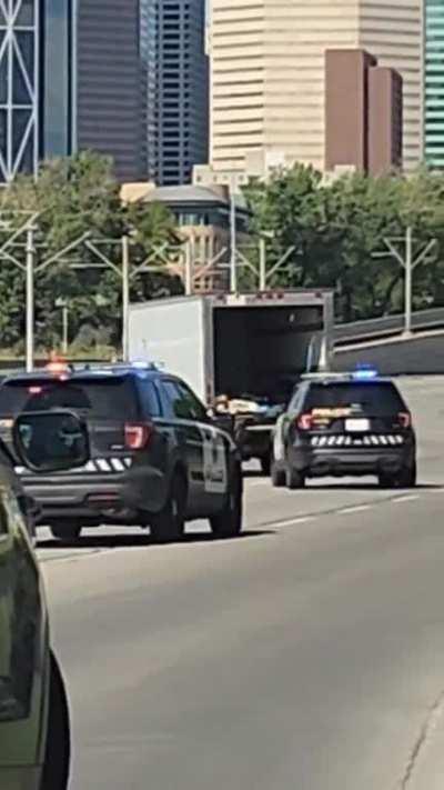 Low speed police chase on Memorial this afternoon 