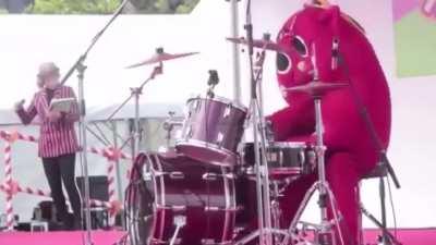 Costumed Person Destroys The Drums At Children’s Music Concert