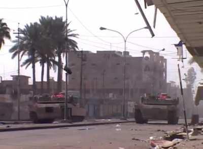 Fallujah 2004 - Marines take fire from building and respond with M1A1 Abrams