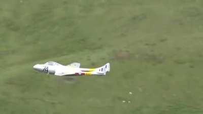 De Havilland Vampire flying the Mach Loop.