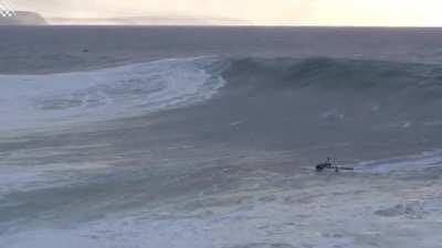 Jet Skier Saves Surfer From A Monster Wave