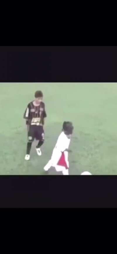 Uzi stand on the ball and know hes taller than the defender