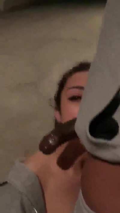 Fucking her mouth in a garage