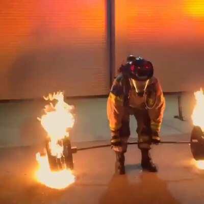 50 year old firefighter deadlifts 600 lbs of flaming steel to celebrate his retirement