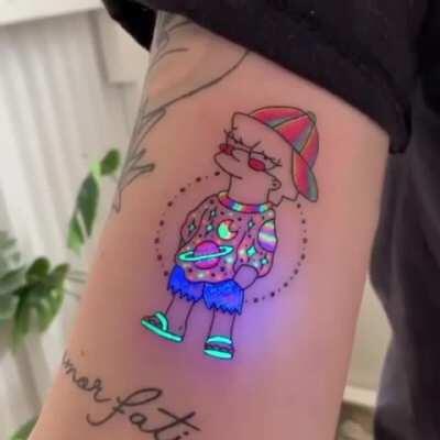 Blacklight tattoo created using ultraviolet reactive ink