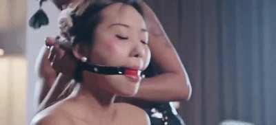 Asian girl getting gagged