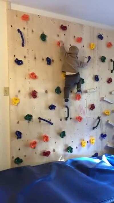 Father built his kid a climbing wall to get him to stop climbing furniture and it only made the tot more powerful