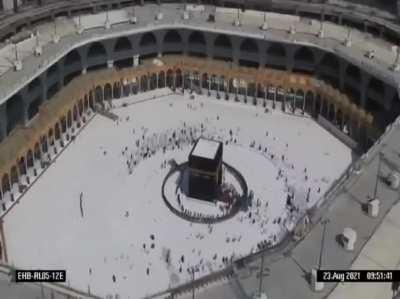 Washing Al Kabaa interior, Al Kabaa Door opens twice a year for cleaning, some people might get a bit too excited, hence the National Guards forming barriers