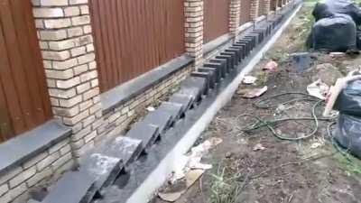 The way he builds this brick wall. Wait for it.....