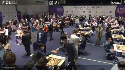 Confused Covid handshake from the Chess World Cup