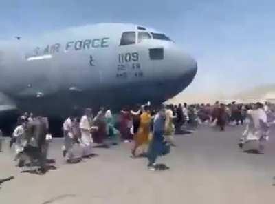 KABUL AIRPORT same as World War Z. I just can't, this is too much to handle. God Save them