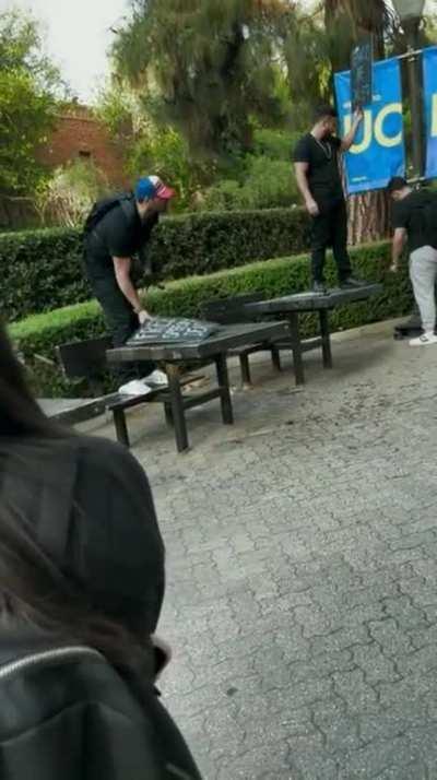 Haz and Jon Zherka getting coffe thrown at them at UCLA